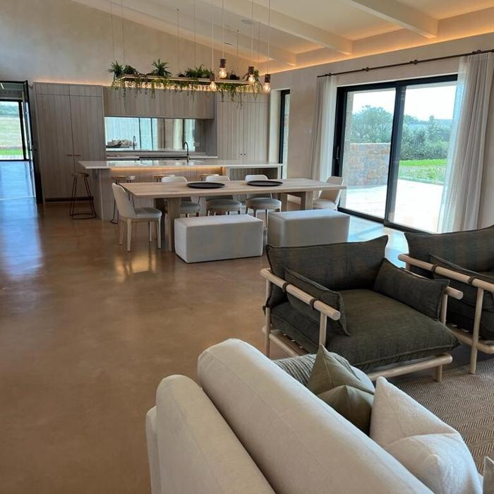 Open-plan living area with polished concrete floors