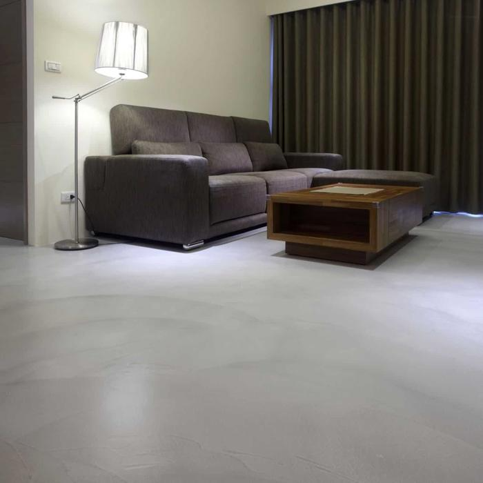 Living room with grey polished concrete floor