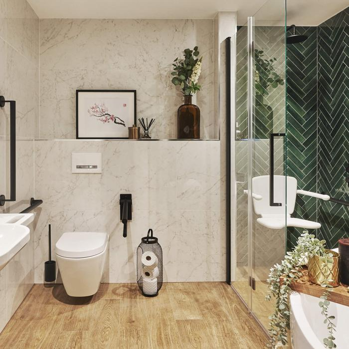 Modern bathroom with green herringbone and white marble tiles