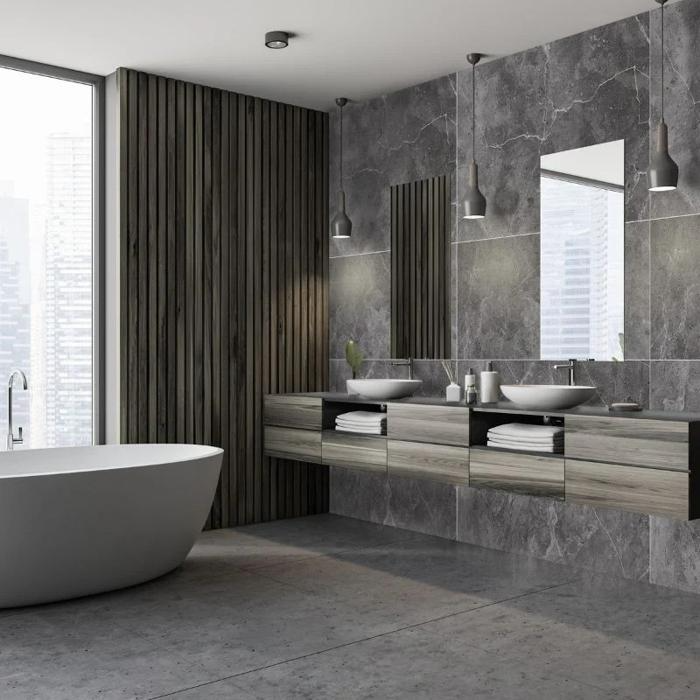 Contemporary bathroom adorned with dark grey stone tiles