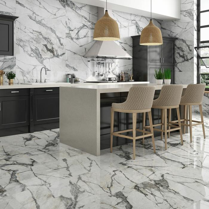 Kitchen island and chairs with marble flooring