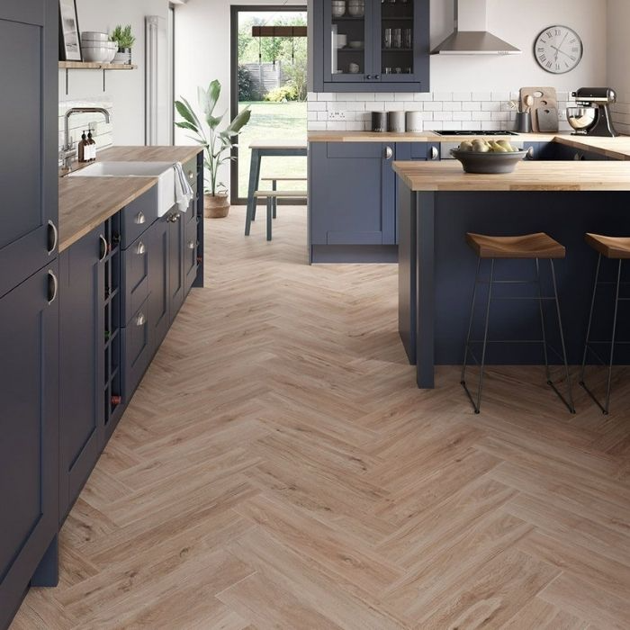 Farmhouse kitchen with oak herringbone flooring