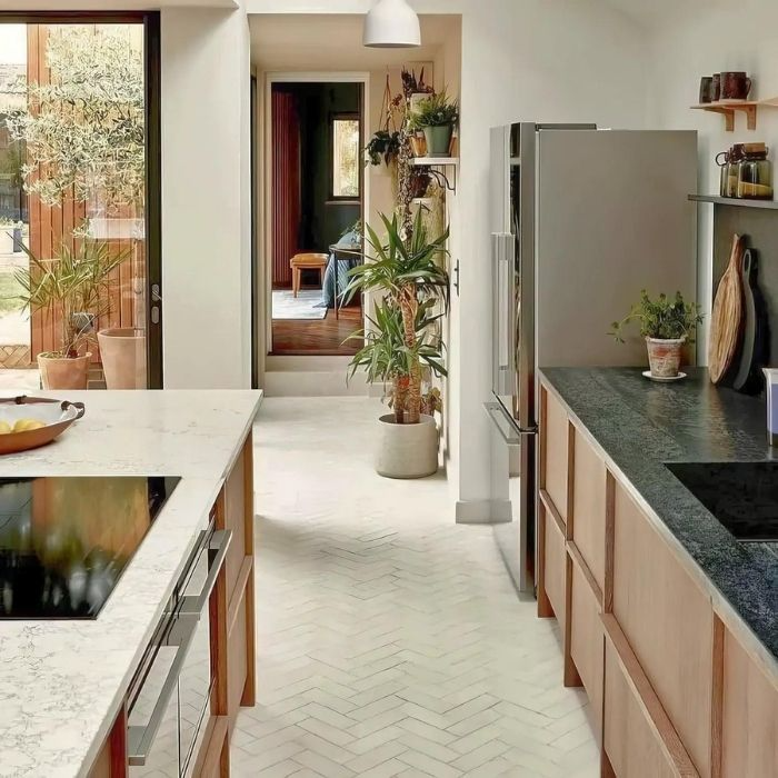 Modern kitchen with white herringbone flooring