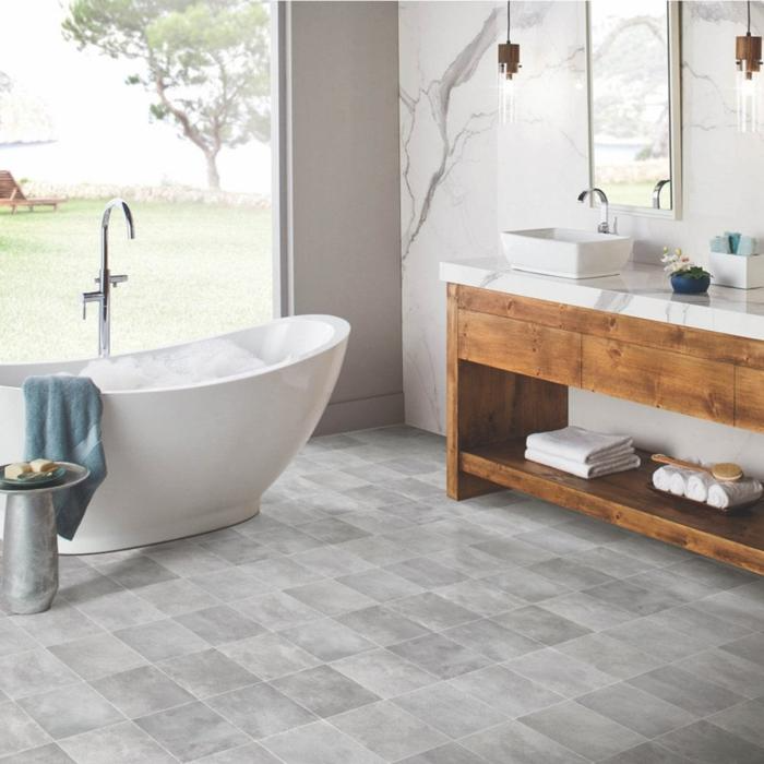 Bathroom with light grey square floor tiles