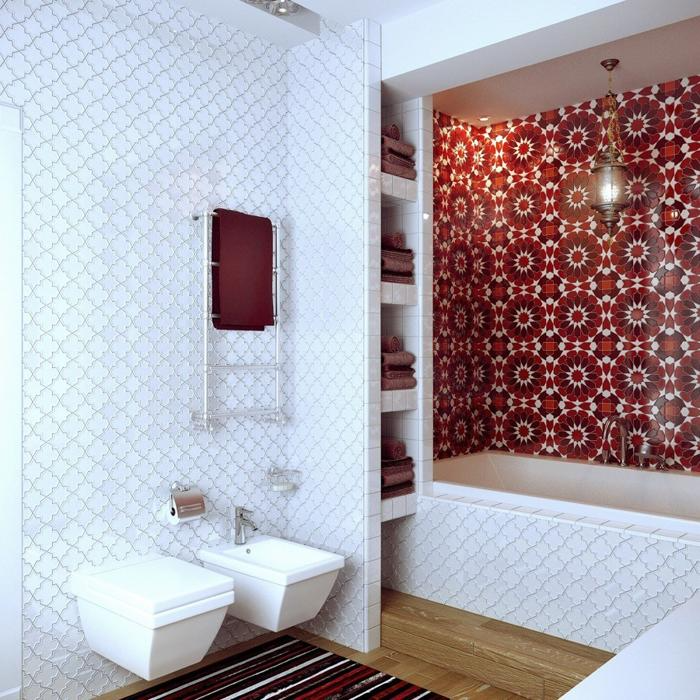 Red patterned tiles around the bathtub with white walls