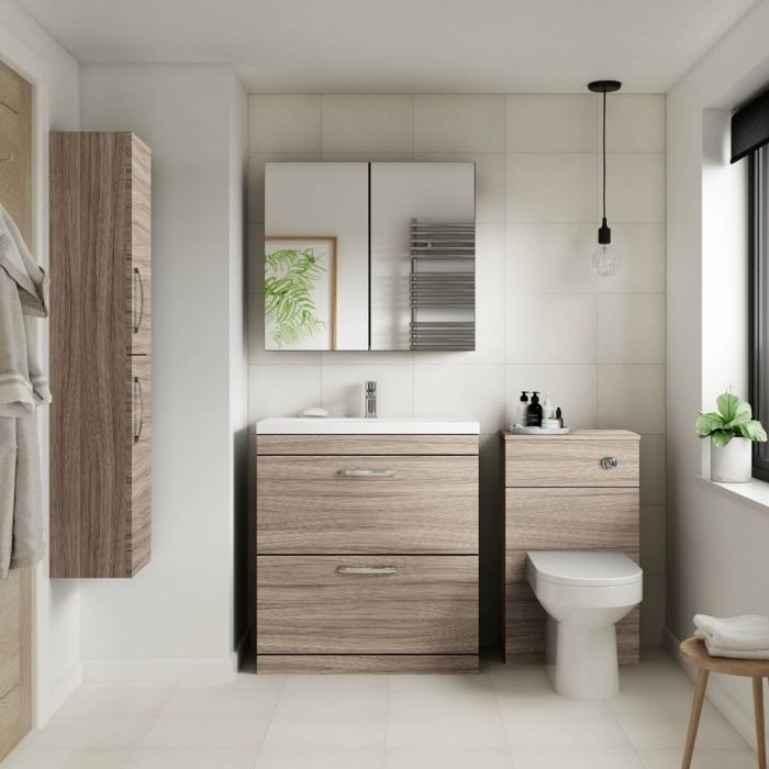 Light wood bathroom vanity with neutral wall tiles