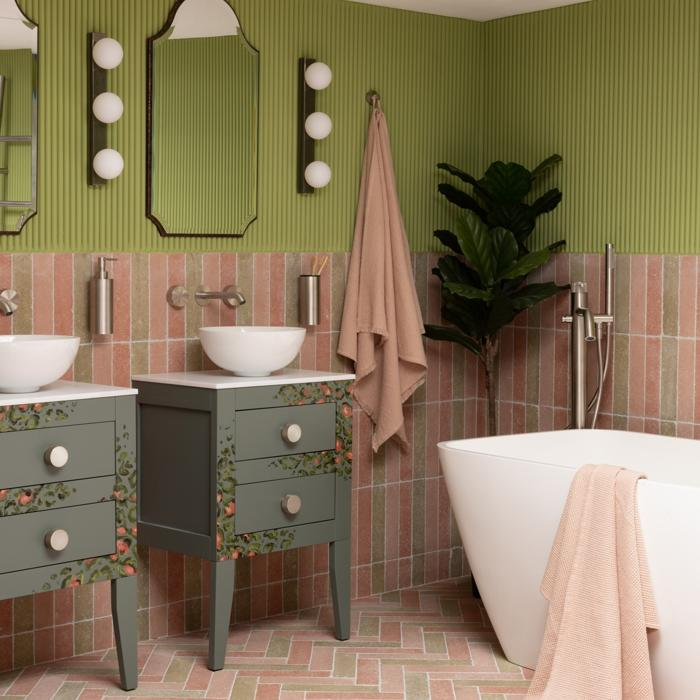 Green bathroom with terracotta herringbone tiles