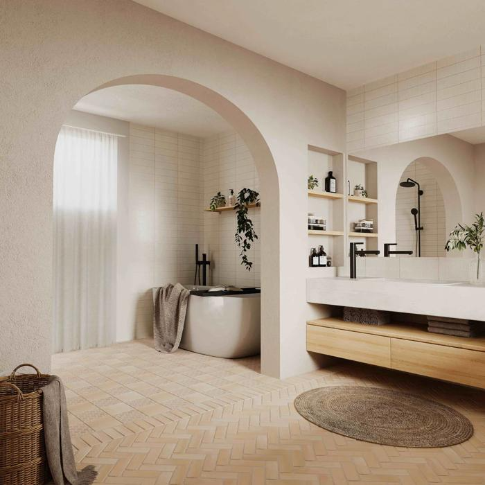 Neutral bathroom with terracotta herringbone tiles