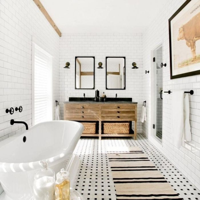 Bathroom with subway tiles and wooden double vanity