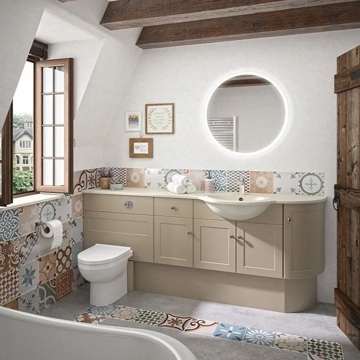 Colourful patterned tiles in cosy family bathroom with wooden beams