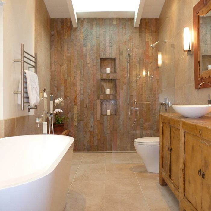 Wood panelled shower area with natural stone tiles