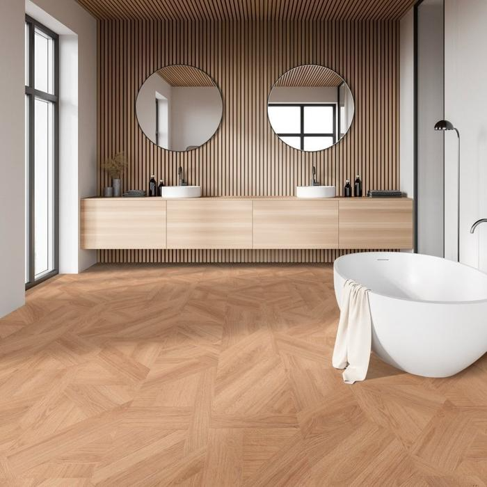 Ensuite with wood tiles and round mirrors