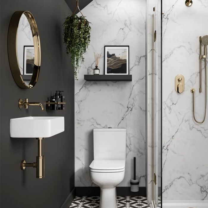 Marble effect tiles with black accents in a bathroom