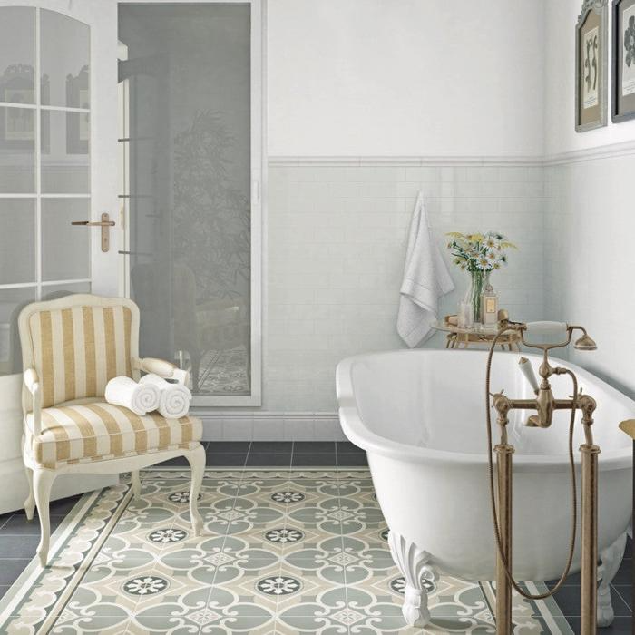 Vintage bathroom with patterned floor tiles and clawfoot tub