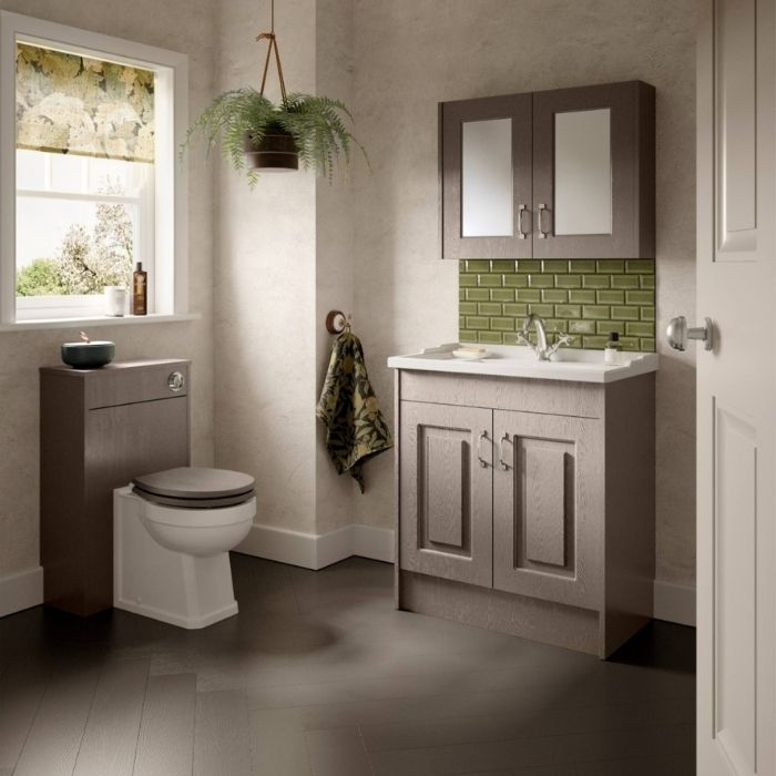 Small bathroom with green metro tiles and wooden cabinetry