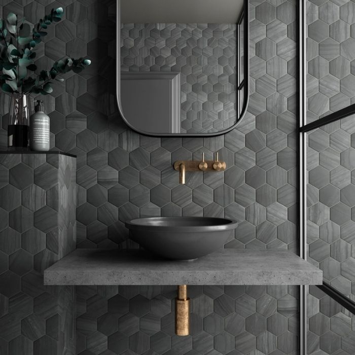 Hexagon black tiles with a matte finish in a stylish bathroom