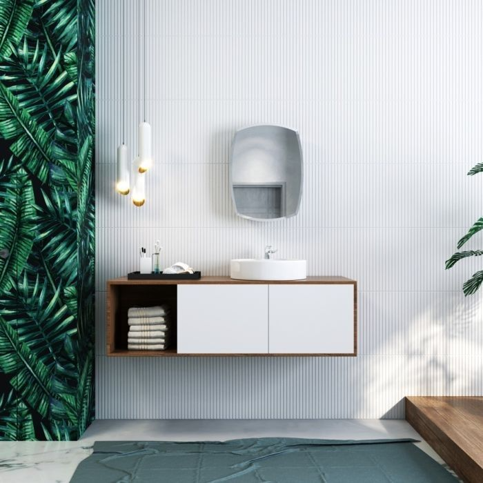 White floating vanity with wooden accents and leaf-patterned tiles