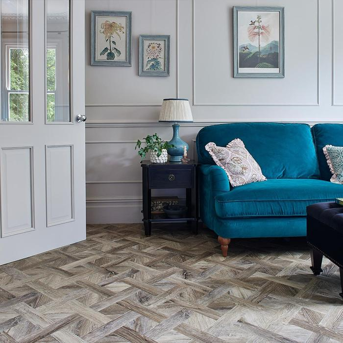 Cosy living room with patterned solid oak flooring