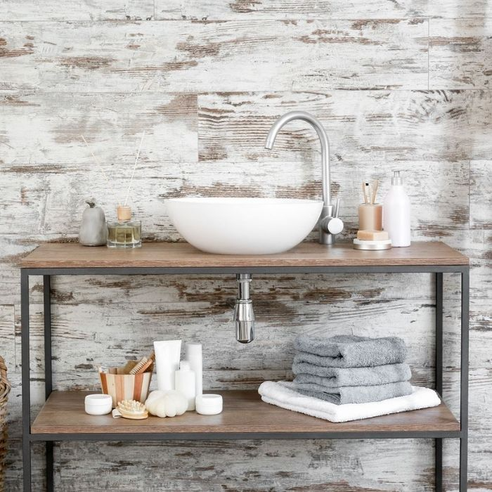 Rustic bathroom sink with weathered wood effect tiles