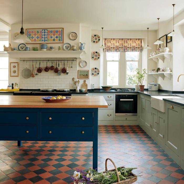 Checkerboard terracotta tiles underneath a vintage kitchen