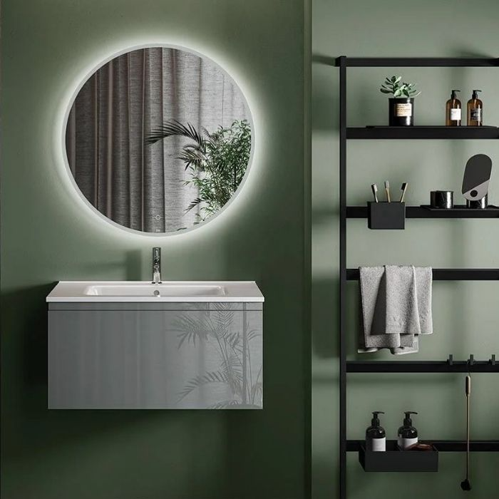 Modern bathroom with green walls and black shelving