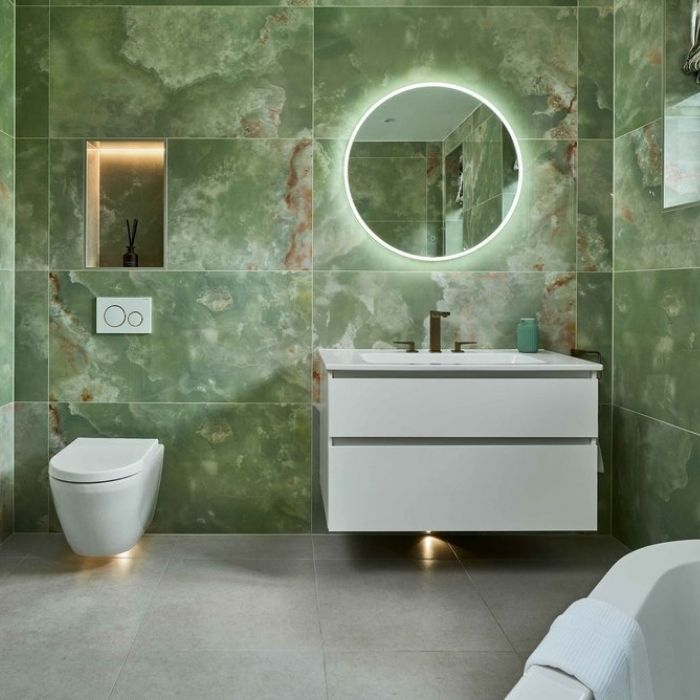 Green marble effect tiles in a modern bathroom