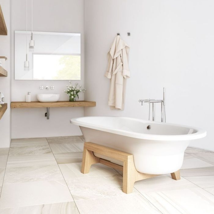 Minimalist bathroom with a freestanding bathtub and wood accents