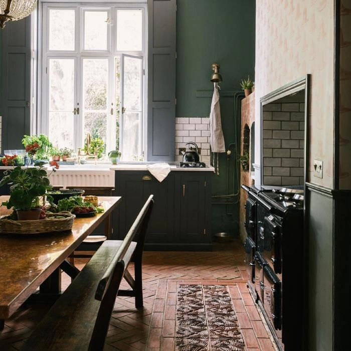 Herringbone terracotta tiles in a vintage kitchen