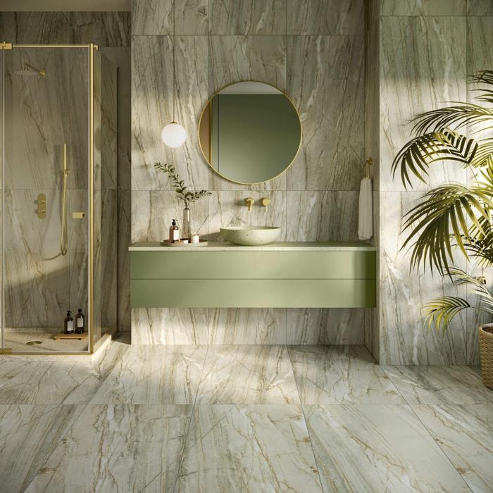 Modern bathroom with green accents and marble tiles