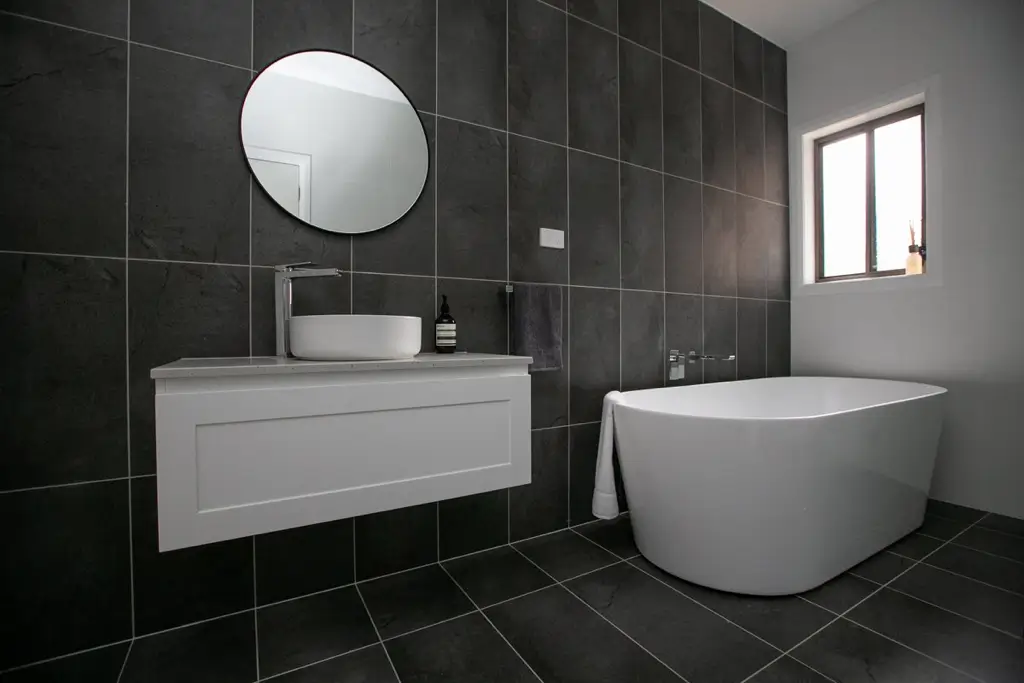 professional covering tiles dark bathroom