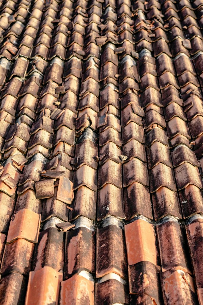 damaged ridge tiles roof closeup