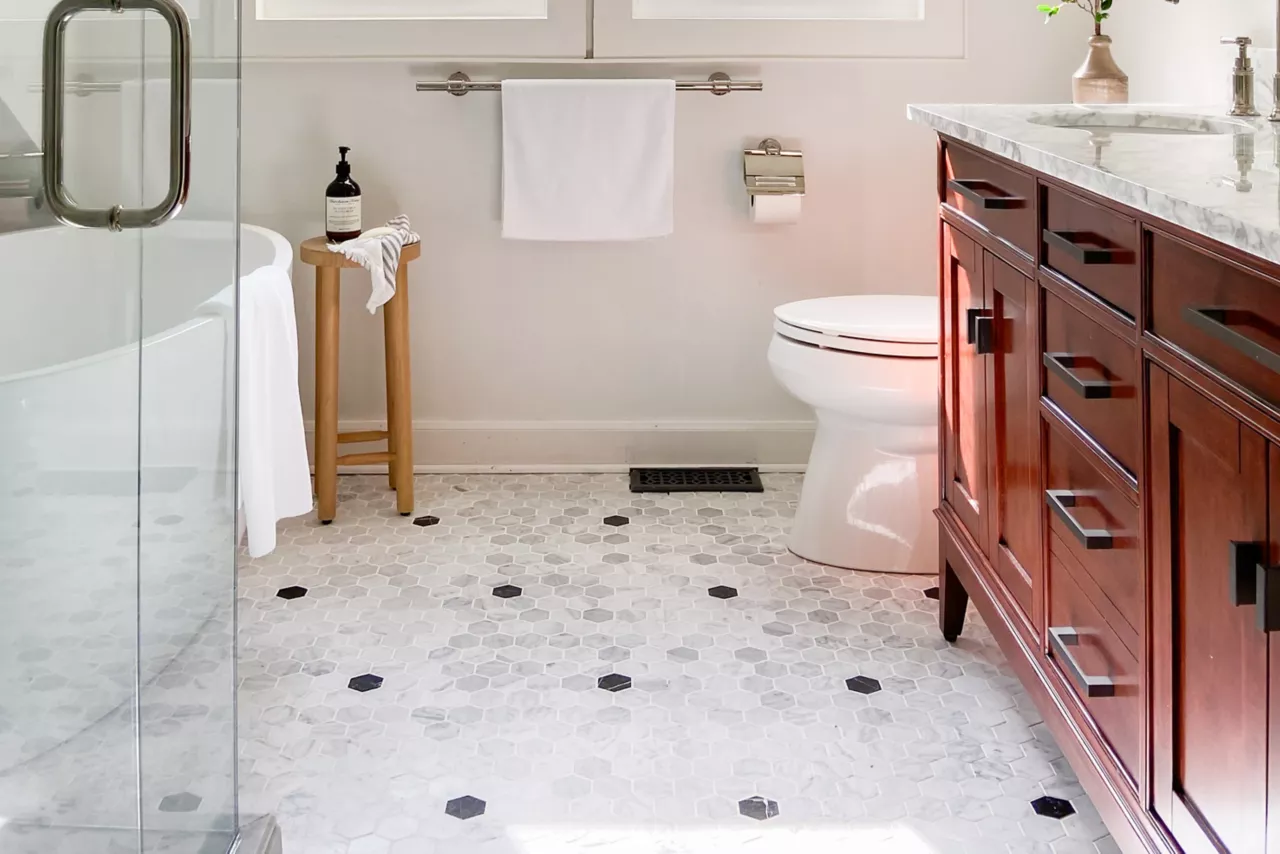 Hexagonal tiles enhance this cozy bathroom
