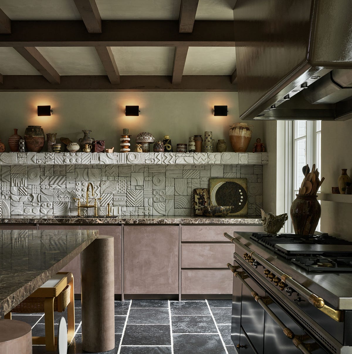 Intricate geometric tiles elevate rustic kitchen decor and design.