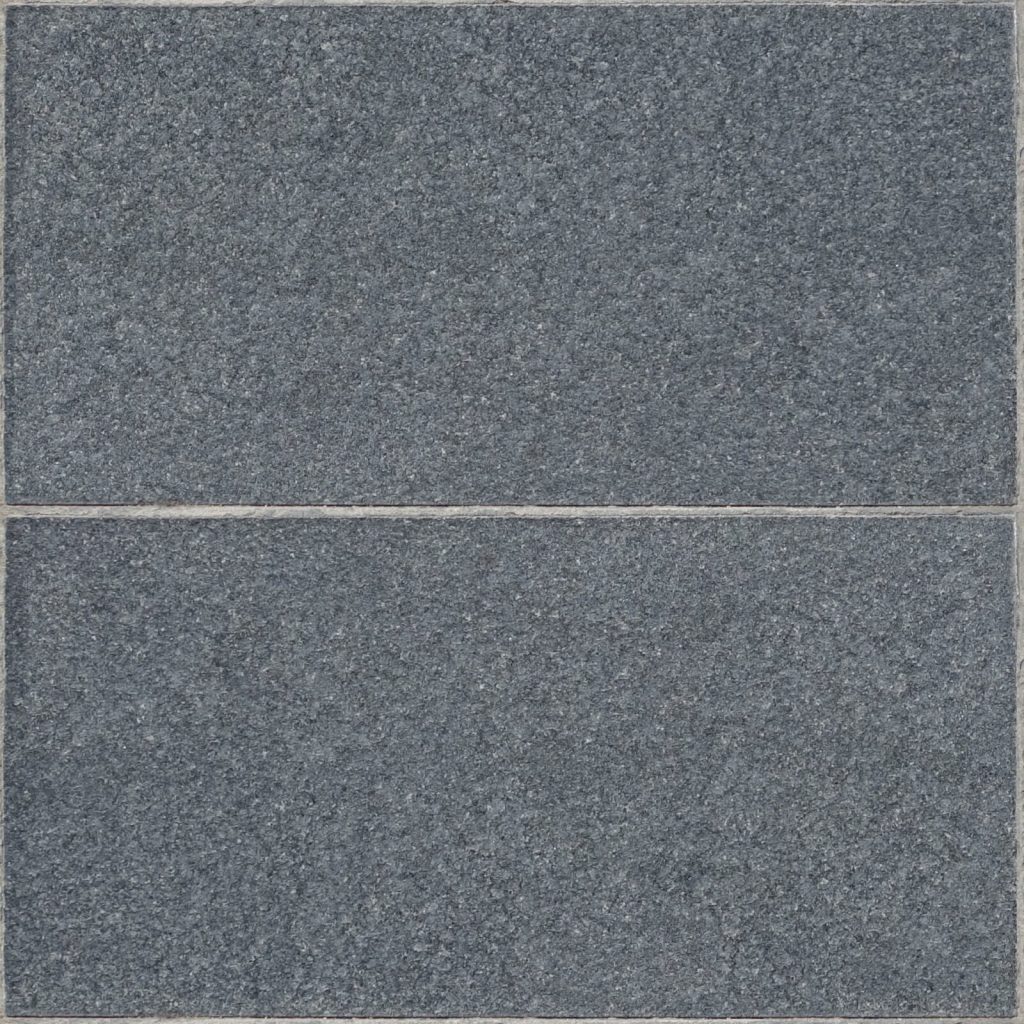 Blue-grey honed slate floor tiles laid in a stretcher pattern with narrow grey joints